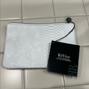 Revive White Textured cosmetic pouch